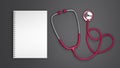 Medical and health care concept. Pink stethoscope and blank spiral notepad on grey background. 3D Rendering.