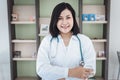 Medical Health Consulting Concept, Female Medicine Doctor Holding Tablet Standing in Clinic Healthcare. Physician Doctor Royalty Free Stock Photo