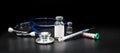 Medical healthcare concept. Diagnosis and cure of Coronavirus. stethoscope, blood test, mask and vials for diagnostic or