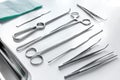 Medical instruments for cosmetic surgery on white table backgrond Royalty Free Stock Photo