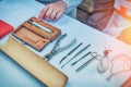 Medical instruments in the field military hospital. Syringe, clamp, scalpel and other tools on the table. Reconstruction of the Royalty Free Stock Photo