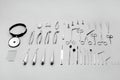 Medical instruments used for surgical operations, laid out on a gray background Royalty Free Stock Photo