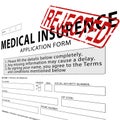 Medical insurance application form with red rejected stamp Royalty Free Stock Photo