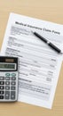 Medical insurance claim form with calculator Royalty Free Stock Photo
