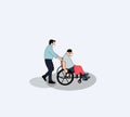 Medical insurance. Man pushing his disabled patient through the park in his wheelchair wearing a mask