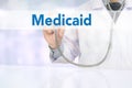 Medical insurance and Medicaid and stethoscope.