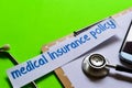 Medical insurance policy on Healthcare concept with green background Royalty Free Stock Photo