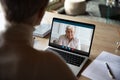 Medical insurer provide consultation to old client online by videoconference Royalty Free Stock Photo