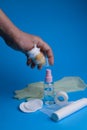 Medical items plaster bandage sanitizer sponge cotton wool medical sterile gloves on a blue background Royalty Free Stock Photo