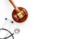 Medical law, health law concept. Gavel and stethoscope on white backgound top view copy space Royalty Free Stock Photo