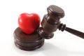 Medical law with heart and judges gavel Royalty Free Stock Photo