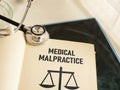 Medical malpractice negligence is shown using the text Royalty Free Stock Photo