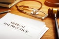 Medical malpractice report and stethoscope. Royalty Free Stock Photo