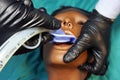 Medical manipulation for airway management. Laryngeal mask airway insertion by stuff in a black gloves on a simulation mannequin