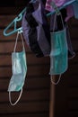 Medical mask prepared to reuse by hanging in sunlight for drying after washing