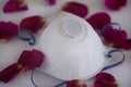 Medical mask with scattered rose petals