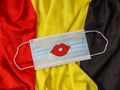 Medical mask with a smile on the Belgian flag Royalty Free Stock Photo