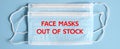 Medical masks blue color with text `face masks out of stock` on a blue background. OFL font