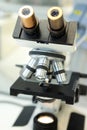 Medical microscope. Professional pharmaceutical microscope. Study of the properties of the drug when increasing. The Royalty Free Stock Photo