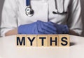 Medical myths concept. Inscription, word about fakes and misinformation about health Royalty Free Stock Photo