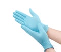 Medical nitrile gloves.Blue surgical gloves isolated on white background with hands. Rubber glove manufacturing, human hand