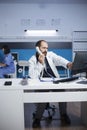 Physician using a landline phone Royalty Free Stock Photo