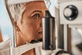 Medical, ophthalmology and eye test by patient senior woman with medical insurance using slit lamp. Mature, optometry Royalty Free Stock Photo