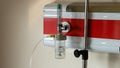 Medical oxygen flow meter working near patient bed in hospital