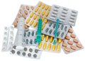 Medical pack of pills and syringe on white Royalty Free Stock Photo