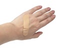 Medical patch plaster on woman hand isolated on the white background Royalty Free Stock Photo