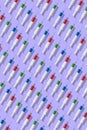 Medical pattern from plastic multicolored disposable syrenges. Royalty Free Stock Photo