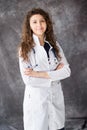 Medical physician doctor woman on gray background