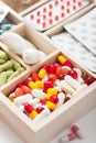 Medical pills and ampules in wooden box Royalty Free Stock Photo