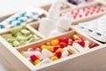 Medical pills and ampules in wooden box Royalty Free Stock Photo