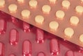 Medical pills in a blister pack of red and golden color