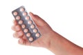 Medical pills container on a female hand, isolated Royalty Free Stock Photo