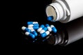 Medical pills isolated on a black background Royalty Free Stock Photo