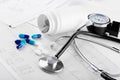 Medical pills and stethoscope Royalty Free Stock Photo