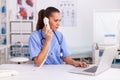 Medical practitioner answering phone calls Royalty Free Stock Photo