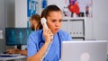 Medical practitioner answering phone calls Royalty Free Stock Photo