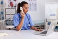 Medical practitioner answering phone calls Royalty Free Stock Photo
