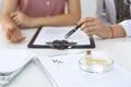 Medical prescription form, capsules and pills are lying against the background of a doctor and patient discussing health Royalty Free Stock Photo