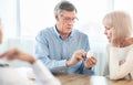 Mature couple asking their doctor about treatment Royalty Free Stock Photo