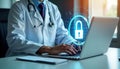 Medical pro types on laptop focused on secure login session. Doctor uses computer for secure patient data. Healthcare tech