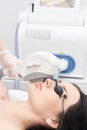 Medical procedure. Hair removal on the face. Laser hair removal. Bright skin