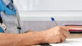 Medical professional doctor writing RX prescription on clipboard. Royalty Free Stock Photo