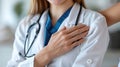 Medical professional with hand on shoulder, offering comfort. Royalty Free Stock Photo