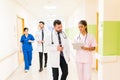 Medical Professionals Discussing Over Reports In Hospital Royalty Free Stock Photo