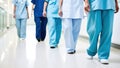 Medical professionals walking in hospital corridor