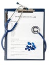 Medical questionnaire document with stethoscope Royalty Free Stock Photo